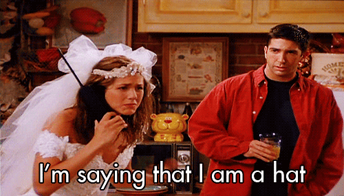 rachel green in a wedding dress, telling her dad on the phone that she doesn't want a hat, she is a hat