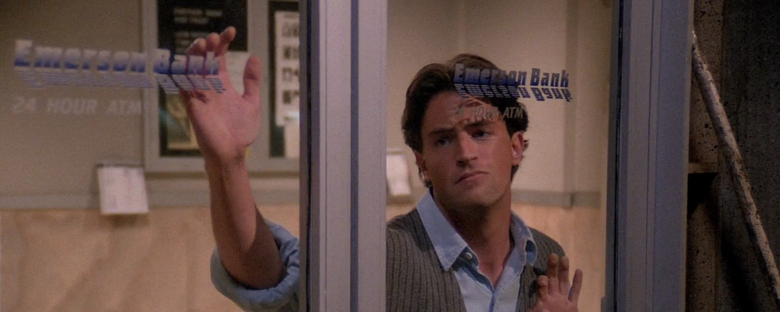 chandler bing slammed against the emerson bank atm vestibule doors wistfully recounting his night with jill